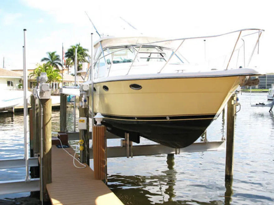 4-Post Boat Lifts installed on a waterfront dock in South Florida