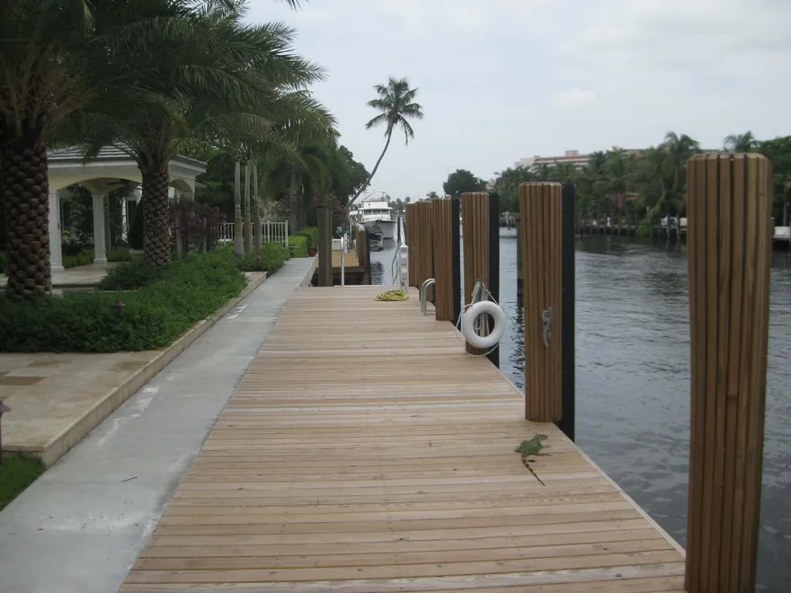 Dock with piling and decking on a single-family waterfront property