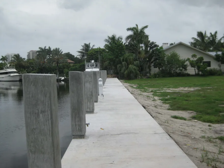 Marine deck and walkway built over a seawall in South Florida